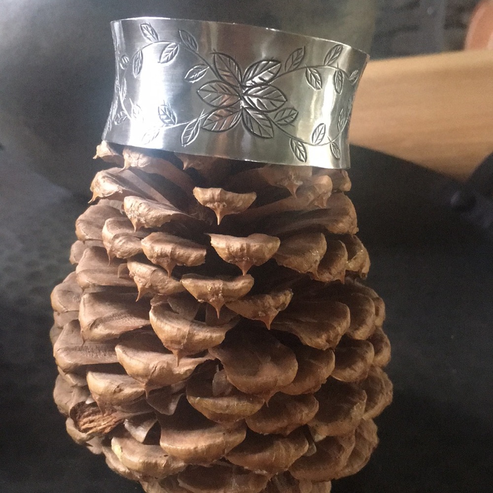 Sterling Silver Cuff. Delicate flower and vine design.